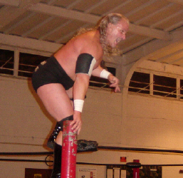George South getting ready to do the Ric Flair top rope spot